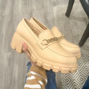 Nude loafers with gold chain